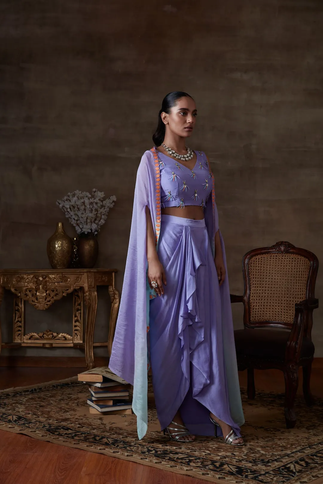 Lilac embroidered bustier with lungi and a cape